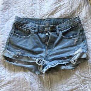 Distressed denim shorts